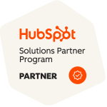 HubSpot Solutions Partner Program badge showing the HubSpot logo, the words Solutions Partner Program, Partner in bold, and an orange checkmark icon inside a circle.